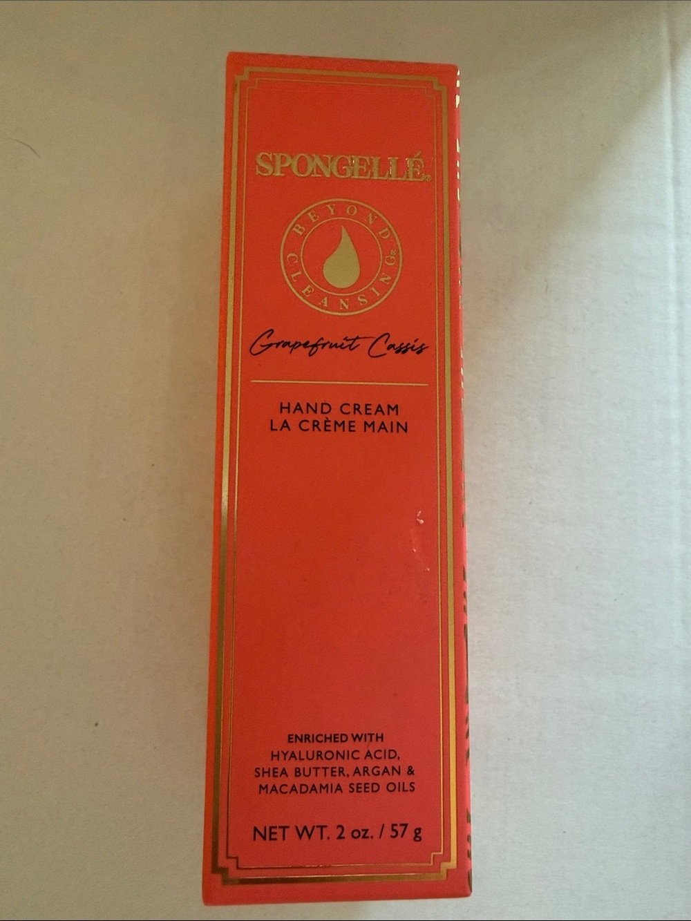 Spongellé Grapefruit Cassis Hand Cream - Coral Orange with Gold Trim